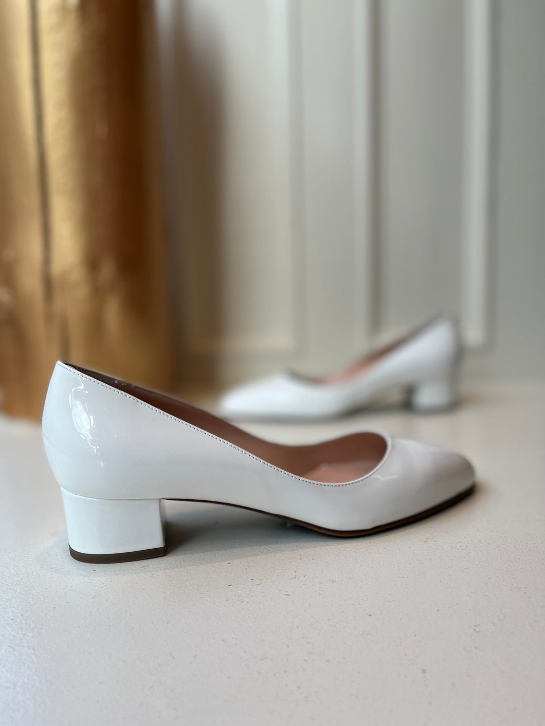 Ida white patent pump